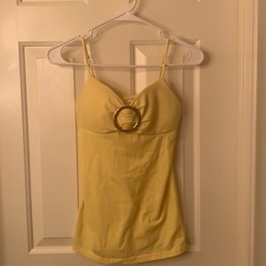 Yellow Sleeveless Top. Size small. Evening. Golden buckle in the front.